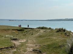 Heading around the point, with Braunton Burrows visible across the water